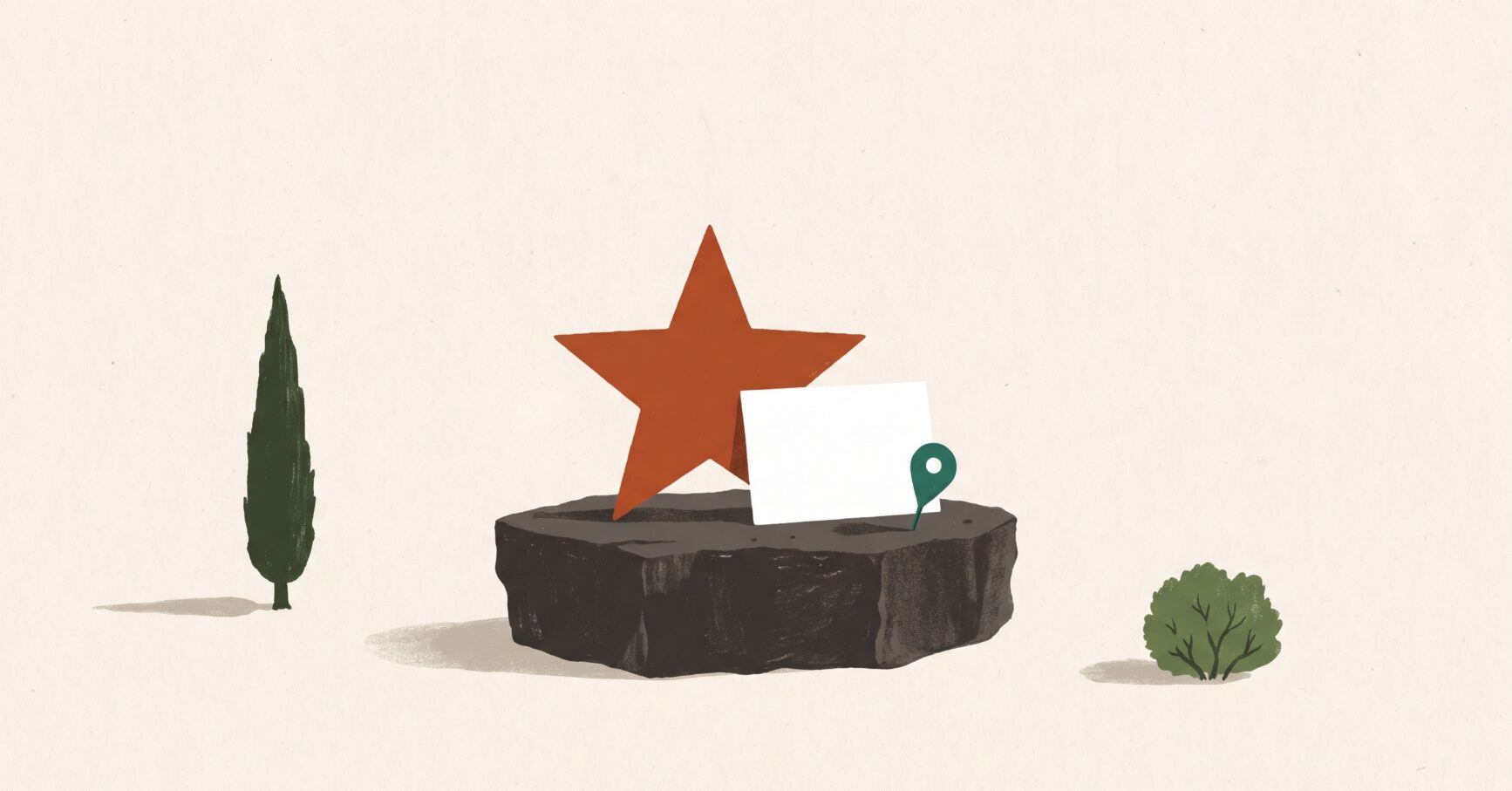 Una estrella, una tarjeta en blanco y un marcador de mapa sobre una piedra de basalto